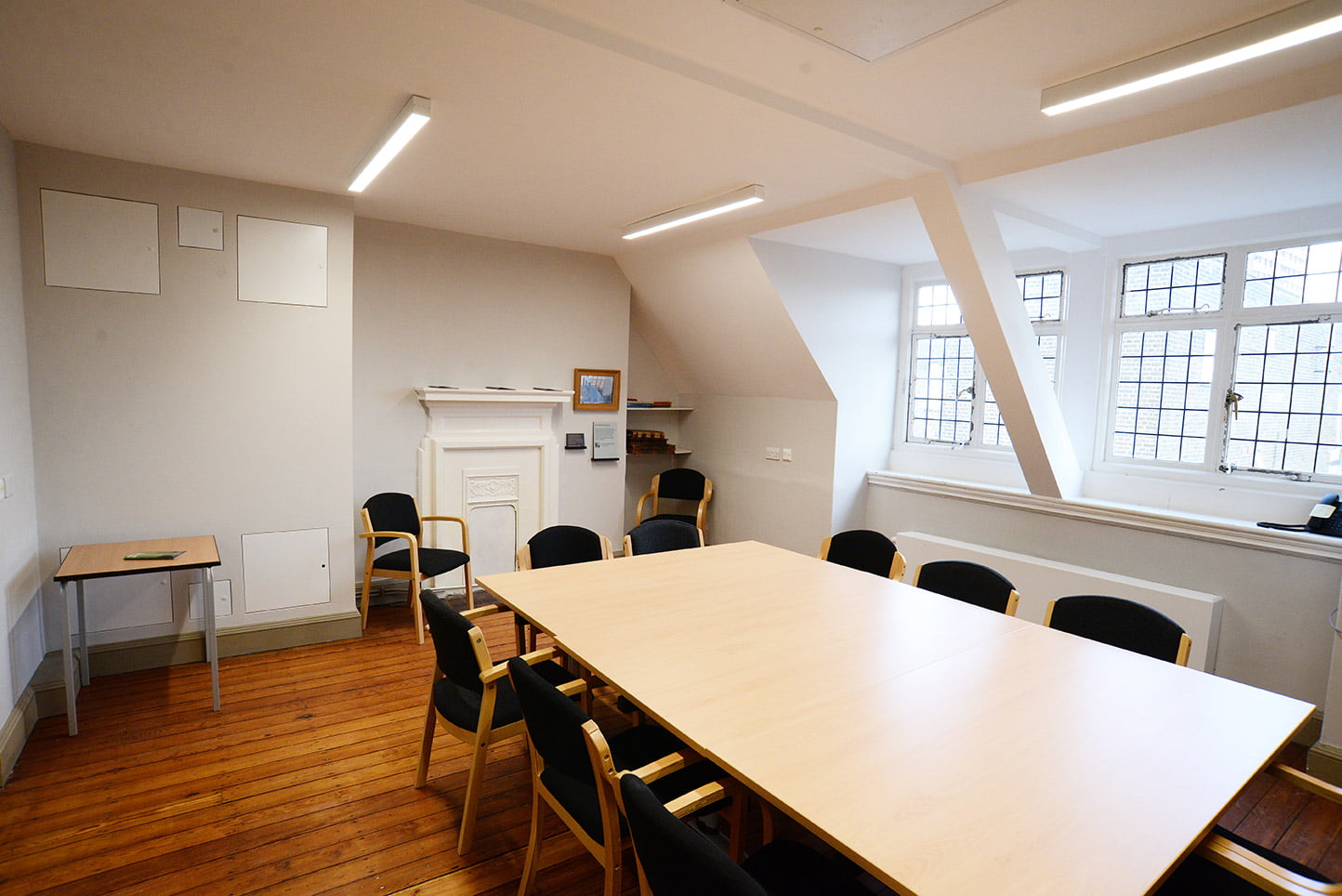 The Settlement Room at Oxford House - Boardroom style set up