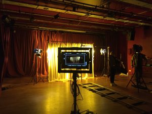 Theatre lights and dolly set up for filming in the theatre